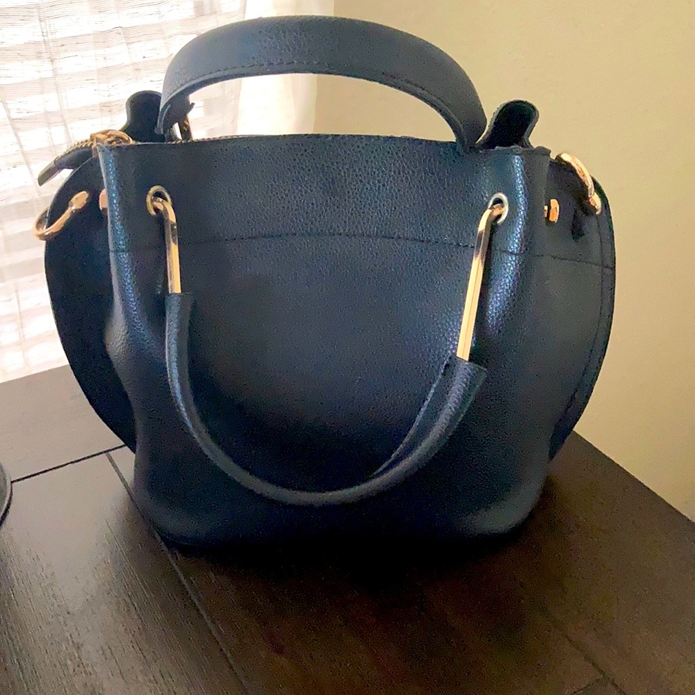 Black arm purse